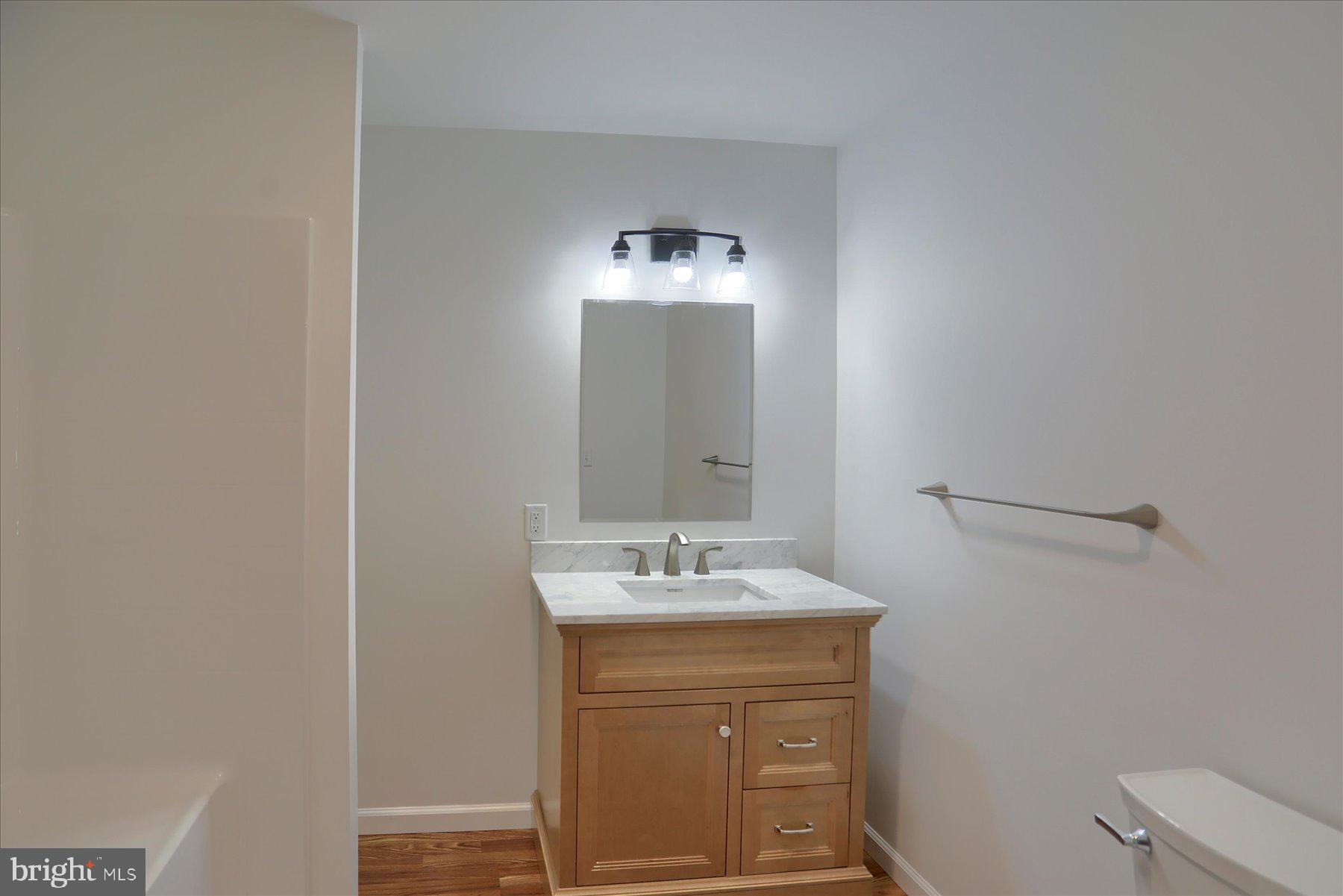 3497 New Lancaster Valley Road Milroy, PA 17063 - Photo 22 of 30 a bathroom with a sink and a mirror