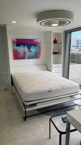 a room with furniture and a chandelier