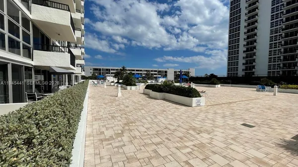 a view of roof with building