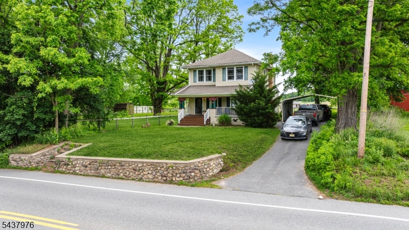 886 Brass Castle Road Belvidere, NJ 07823 - Photo 3 of 44 a front view of a house with a yard