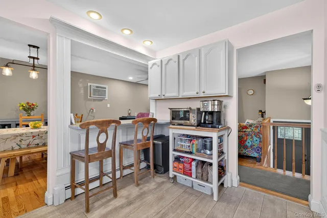 a view of a kitchen with cabinets