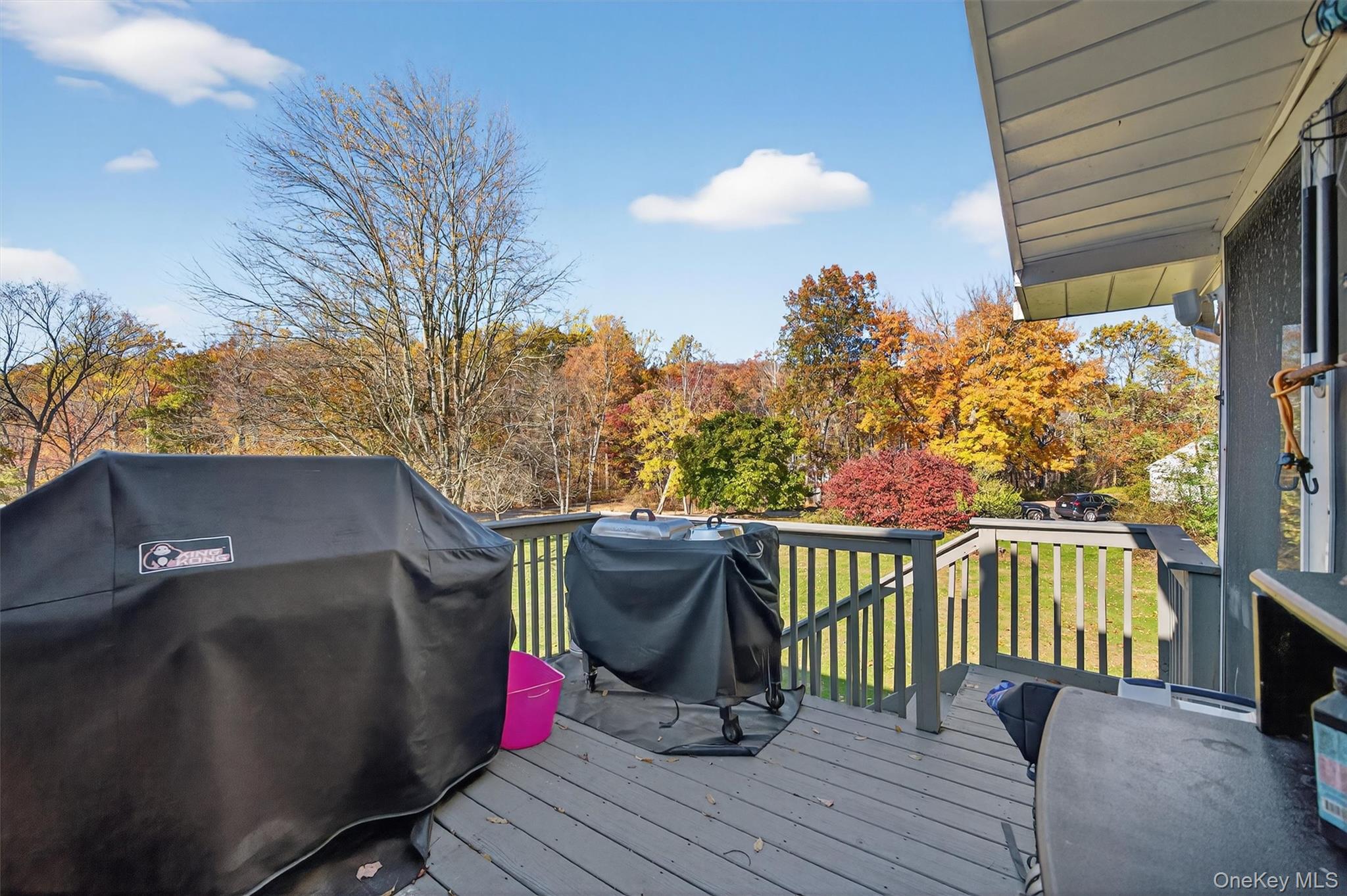 76 Pine Hill Road Highland Mills, NY 10930 - Photo 32 of 41 Wooden deck with a grill and a lawn