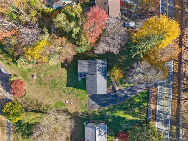an aerial view of residential house with outdoor space