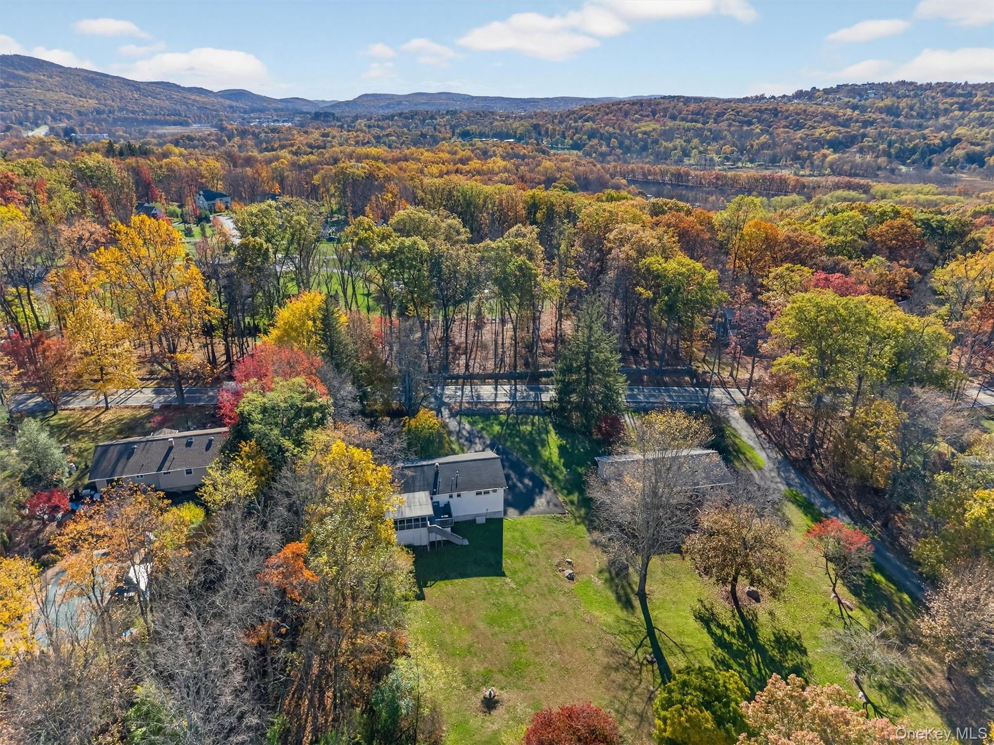 76 Pine Hill Road Highland Mills, NY 10930 - Photo 39 of 41 Drone / aerial view of a heavily wooded area