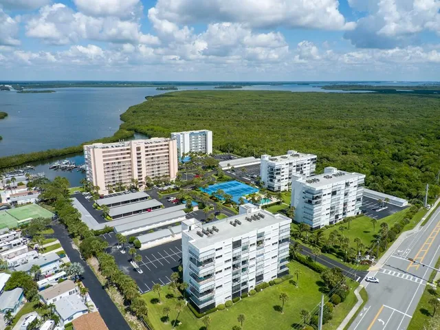a view of a lake with a building in the background