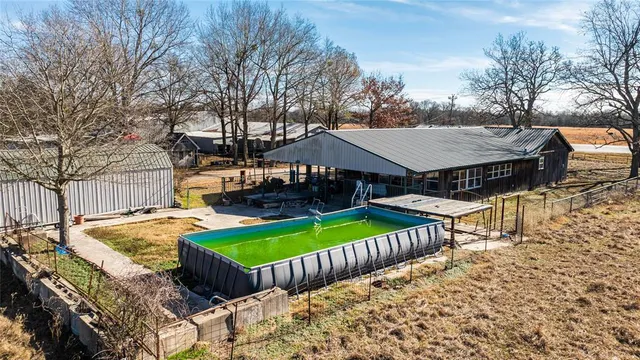 a view of a patio with a yard