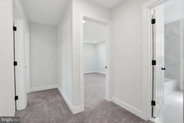 a view of a room with a wardrobe space