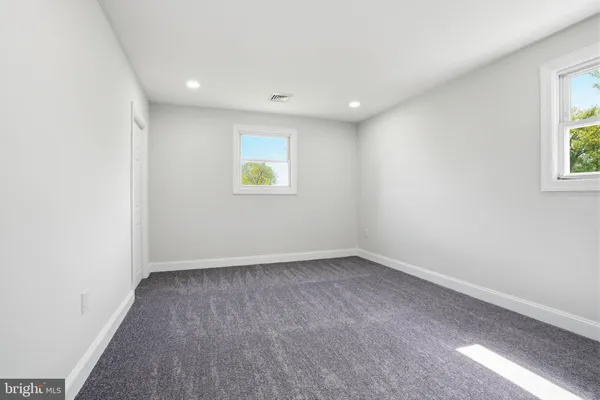 an empty room with window