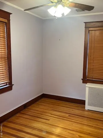 a bathroom with a toilet sink and shower