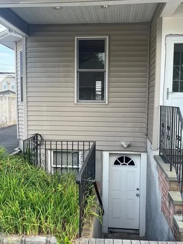 a front view of a house with a garage