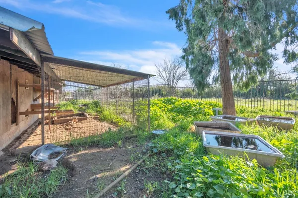a view of a backyard with a garden