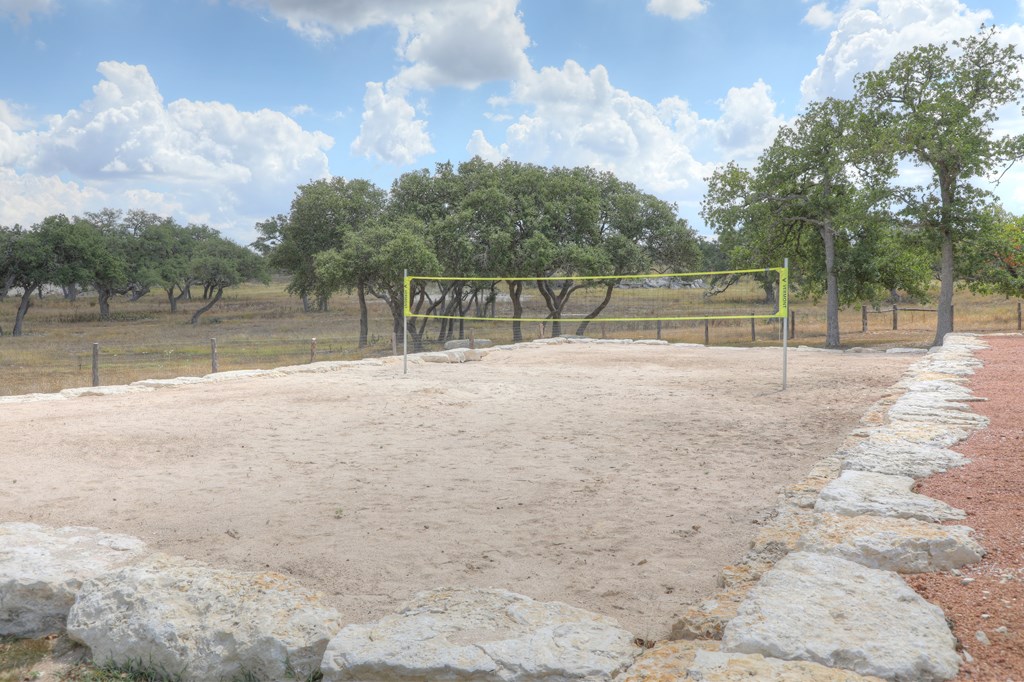 379 Inspiration Loop Comfort, TX 78013 - Photo 27 of 27 a view of swimming pool with a yard and fence