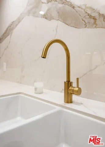 a close view of a sink and tap