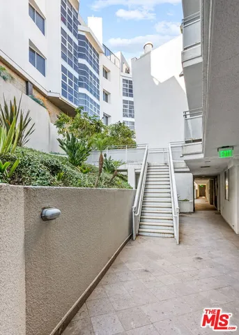 a view of a terrace with outdoor seating