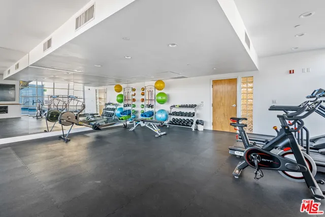 a view of a room with gym equipment