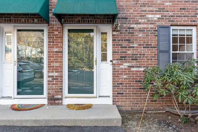 a view of house with a yard