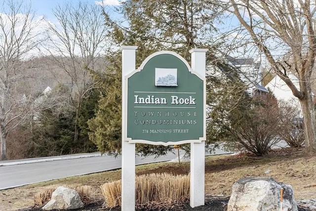 a sign on the side of a road