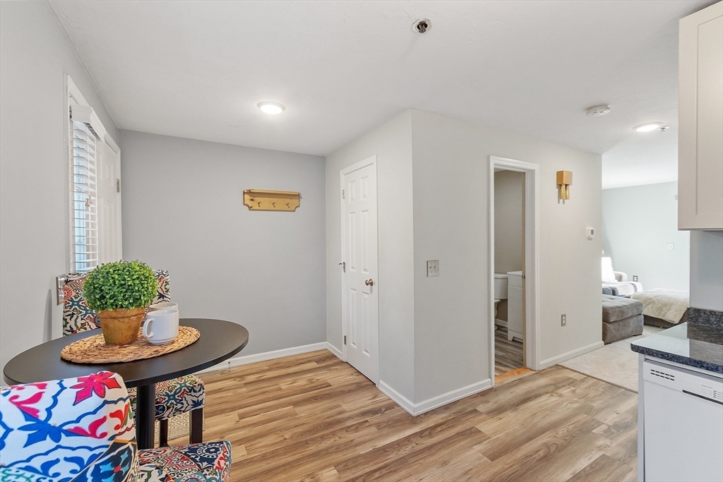 278 Manning Street, Unit 603 Hudson, MA 01749 - Photo 8 of 34 a living room with furniture and a table