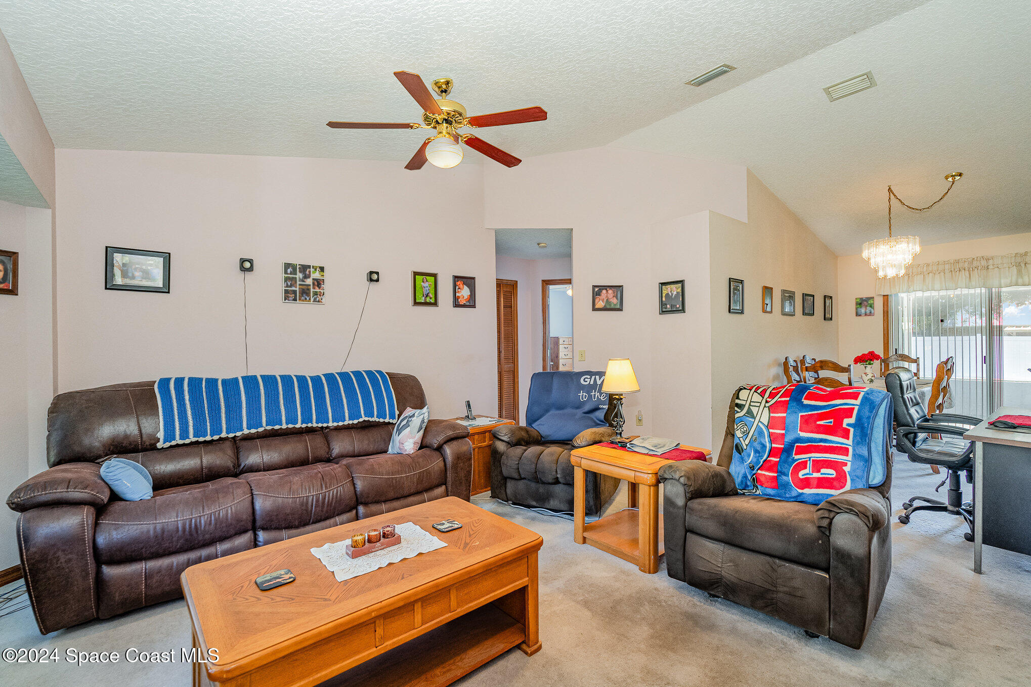 6333 Irving Road Cocoa, FL 32927 - Photo 3 of 26 a living room with furniture and a couch