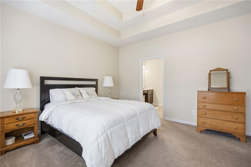2403 Tree Arbor Way Marietta, GA 30064 - Photo 17 of 25 a bedroom with a bed and a dresser
