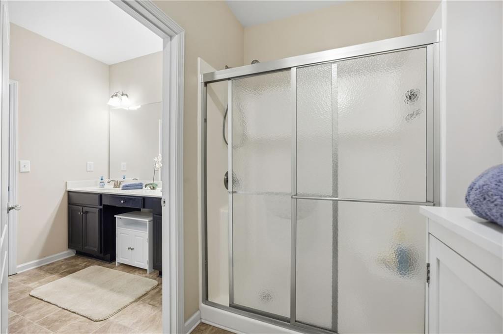 2403 Tree Arbor Way Marietta, GA 30064 - Photo 20 of 25 a bathroom with a shower and a sink