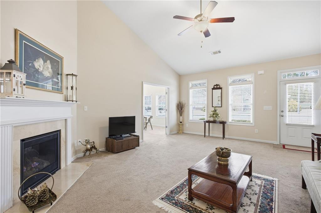 2403 Tree Arbor Way Marietta, GA 30064 - Photo 5 of 25 a living room with furniture and a fireplace
