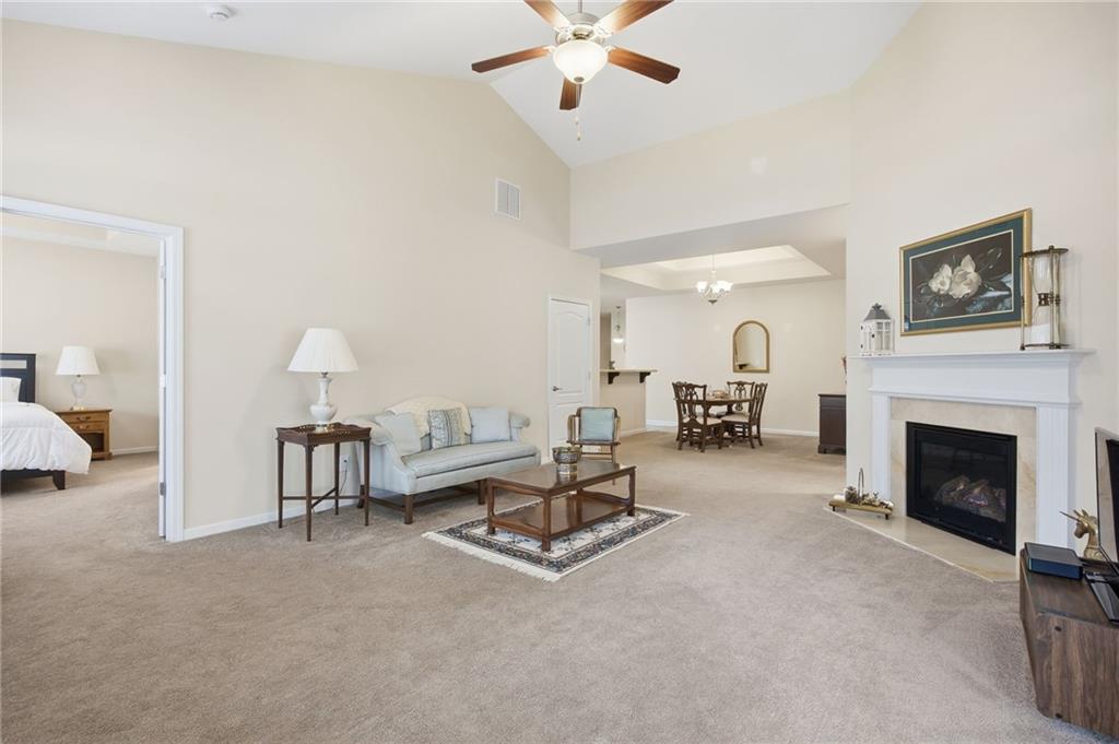 2403 Tree Arbor Way Marietta, GA 30064 - Photo 6 of 25 a living room with furniture and a fireplace