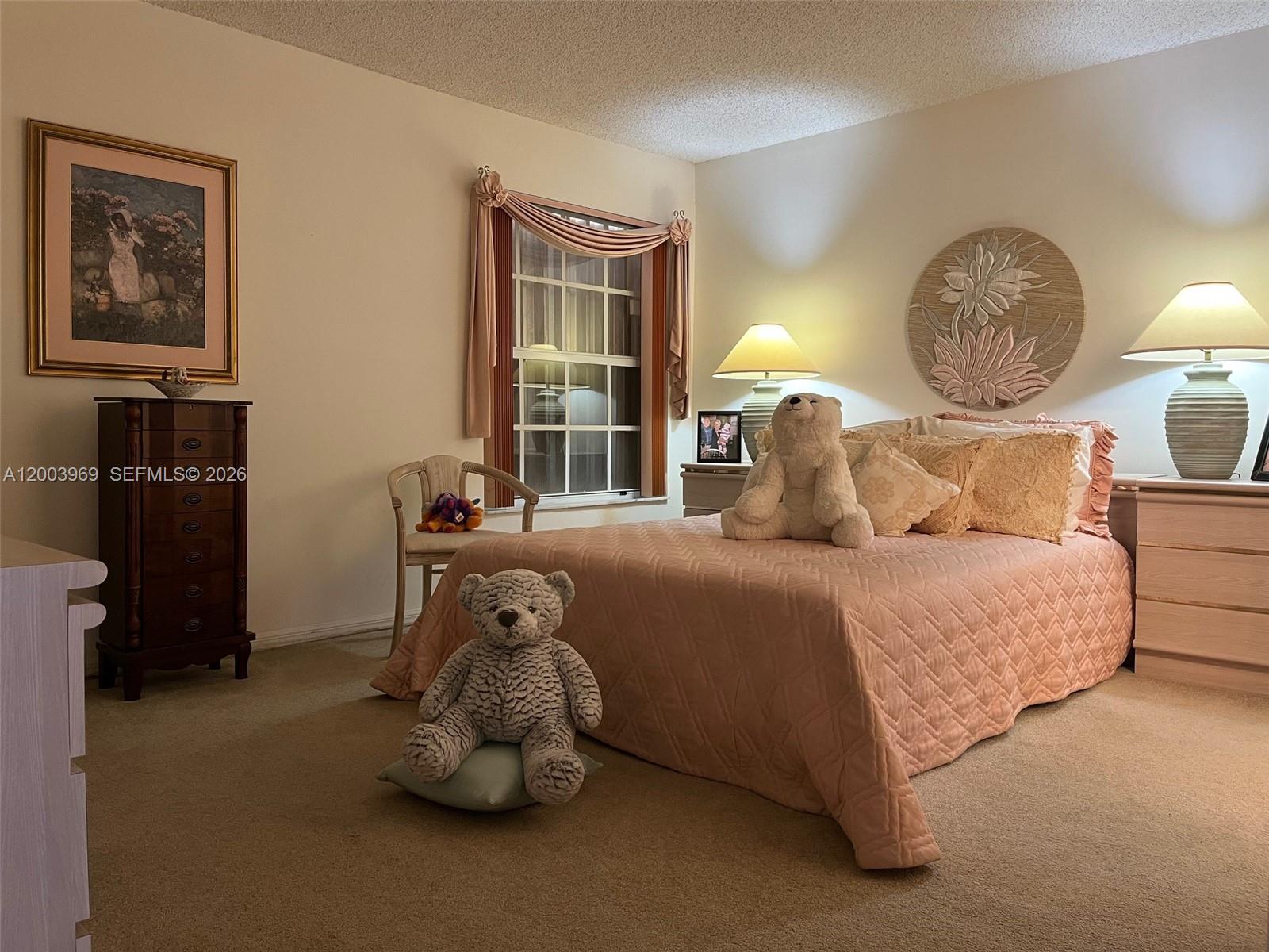6061 Southwest 128th Court Miami, FL 33183 - Photo 11 of 16 a bedroom with a bed and a closet