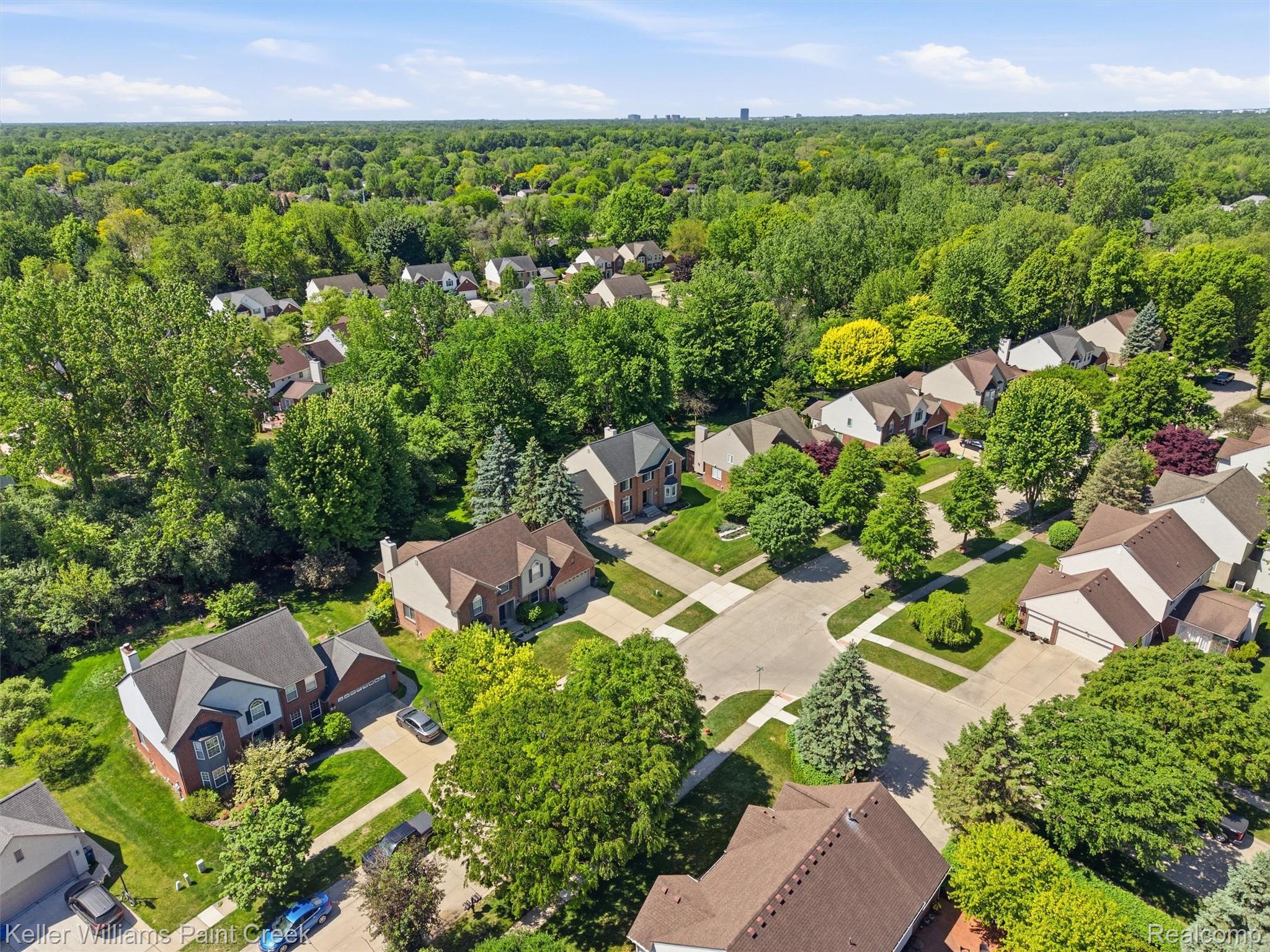 2842 Manorwood Road Troy, MI 48085 - Photo 16 of 72 Aerial perspective of a tree-lined residential neighborhood