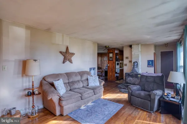 a living room with furniture and a couch