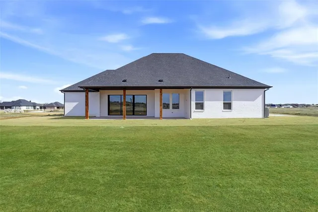 a view of a town with an ocean view
