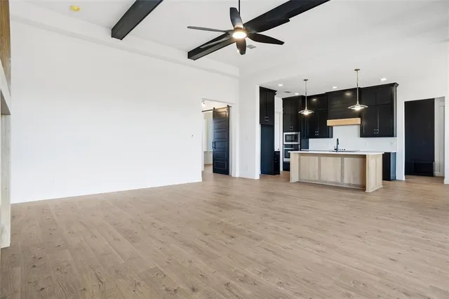 a view of a livingroom with a flat screen tv