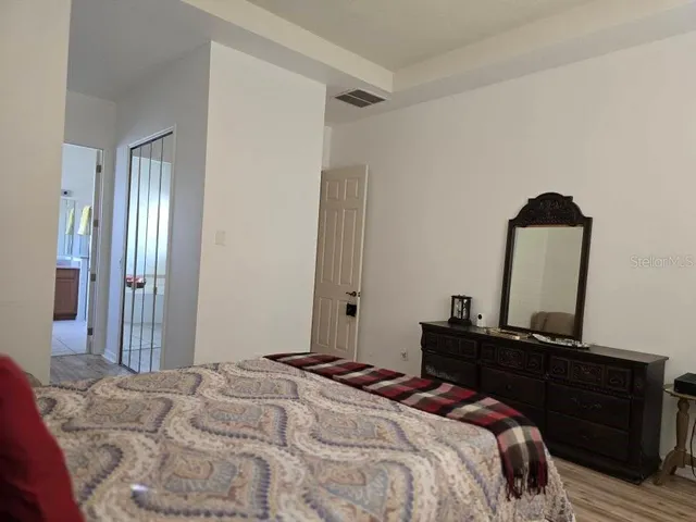 a view of a bathroom from a hallway