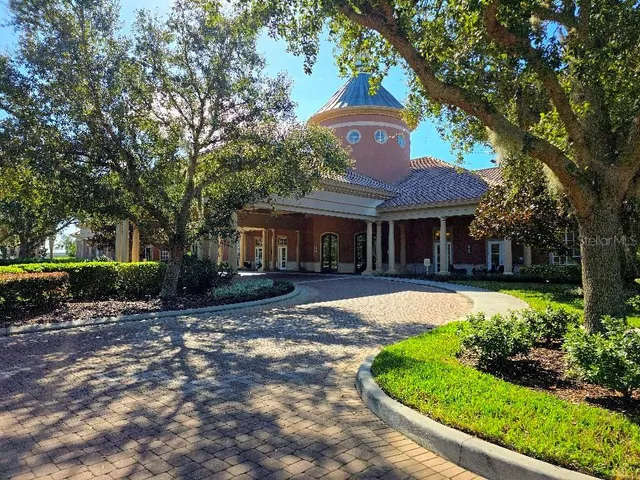 a room with lots of chairs and mirrors