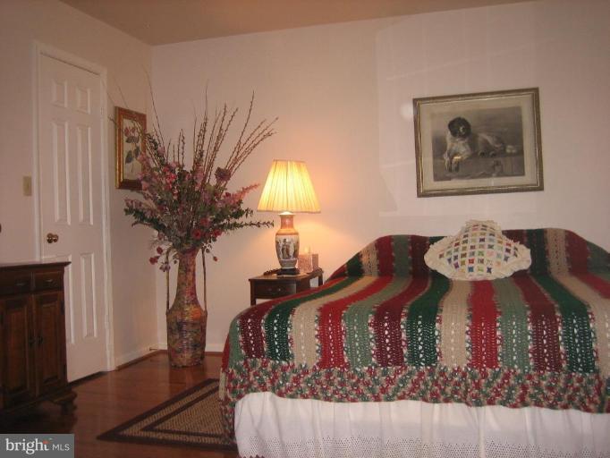 6542 Little Ox Road Fairfax Station, VA 22039 - Photo 15 of 30 a vase of flowers sitting on a table