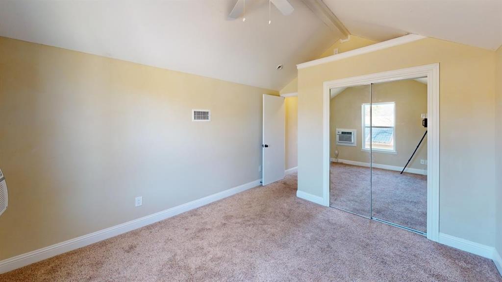 3005 Meandering Way Bedford, TX 76021 - Photo 13 of 22 an empty room with a bathroom and mirror