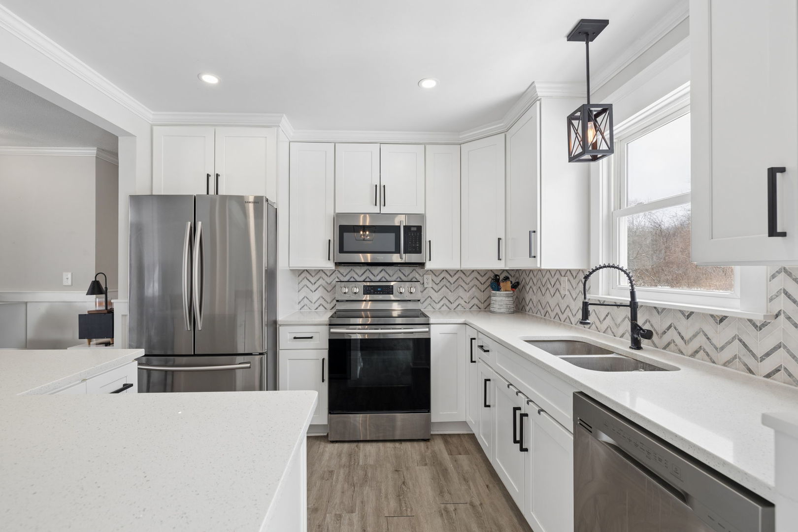 24254 South Burr Road Channahon, IL 60410 - Photo 6 of 22 a kitchen with a sink stainless steel appliances and cabinets