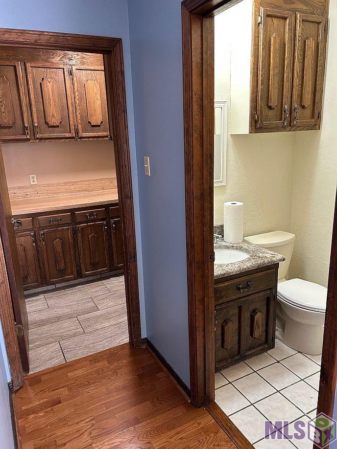 8523 Briarwood Place Baton Rouge, LA 70809 - Photo 17 of 38 Half Bath and A Peek at the Laundry Room
