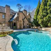 a view of a house with swimming pool