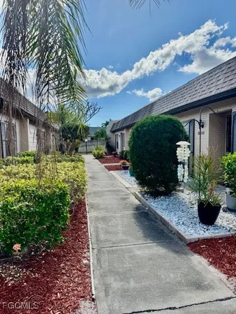 a view of a garden with pathway