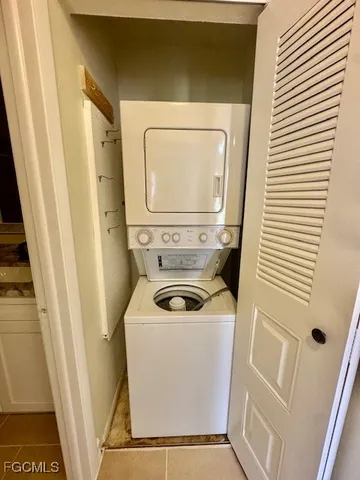 a bathroom with a mirror a sink and vanity