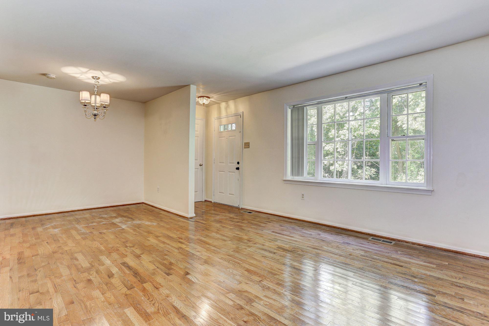9776 Whiskey Run Laurel, MD 20723 - Photo 3 of 15 a view of an empty room with a window
