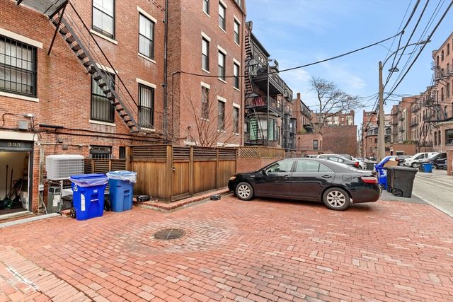a car parked in front of a building
