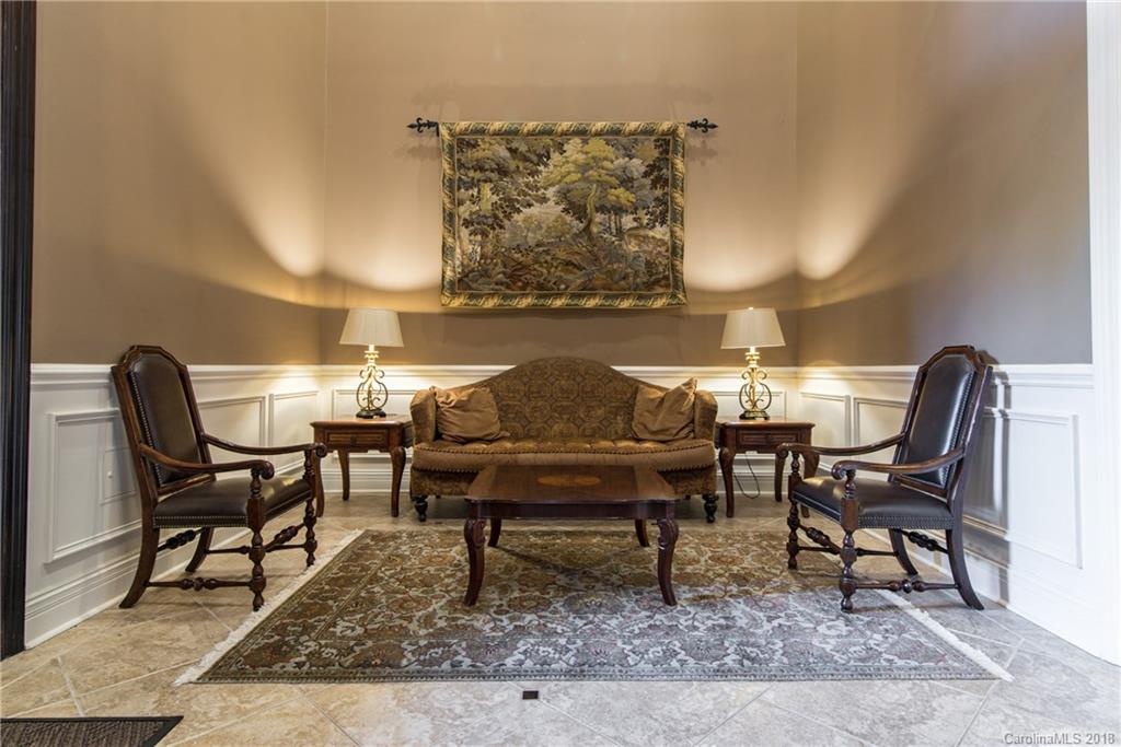 3272 Park Road Charlotte, NC 28209 - Photo 6 of 31 a living room with furniture and a rug