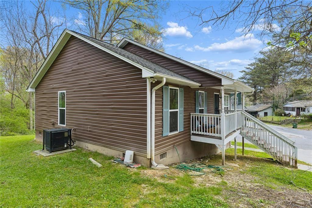 67 Johnson Road Northwest Atlanta, GA 30318 - Photo 2 of 31 a view of house with a yard