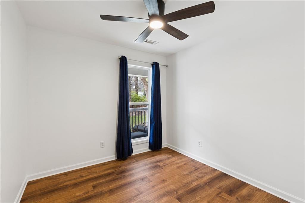 67 Johnson Road Northwest Atlanta, GA 30318 - Photo 24 of 31 a view of an empty room with a window