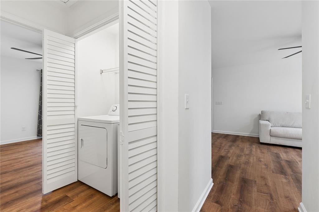 67 Johnson Road Northwest Atlanta, GA 30318 - Photo 25 of 31 a view of a livingroom with furniture and wooden floor