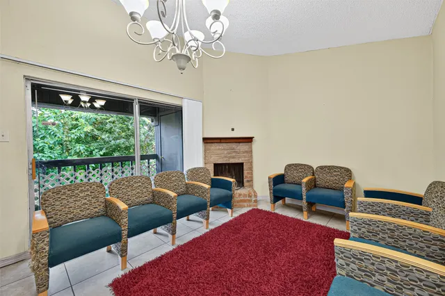 a kitchen with a sink and a refrigerator