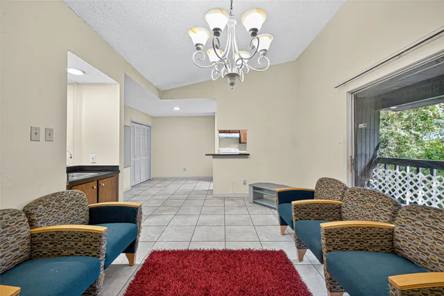 a kitchen with a stove and a refrigerator