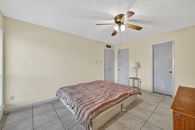 a bathroom with a shower and a toilet